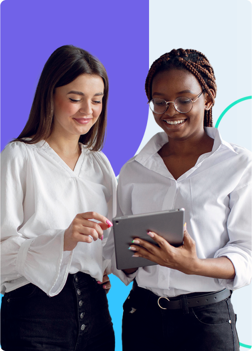 Two women looking at a tablet